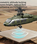 Green D21 Brushless RC Helicopter for Teens 6 Channel Stunt Copter with One Click Inverted Flight hovering above pad