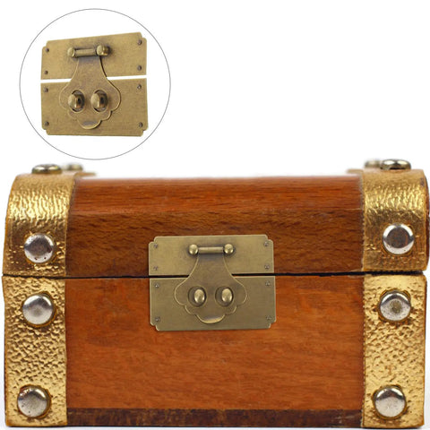 Vintage Brass Hasp Latch Buckle For Jewelry Boxes And Retro Wooden Cases on golden-trimmed wooden box close-up