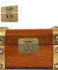 Vintage Brass Hasp Latch For Jewelry Boxes And Wooden Cases on rustic wooden chest with gold accents