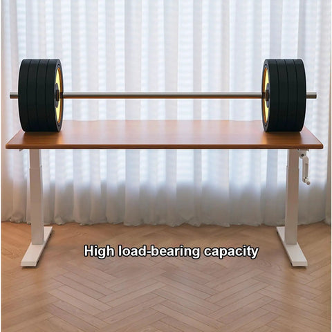 Get Your Posture Locked In With This Cherry Wood Manual Standing Desk And Straight Up Game Changing Crank Lift Mechanism For Home Offices Or Bedrooms Boasting A Foldable Handle And Massive Work Surface with weights showcasing its high load-bearing capacity.