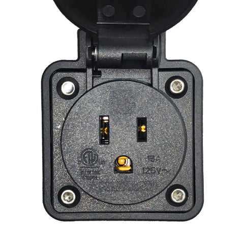Close-up of J1772 to NEMA 5-15 EV Charging Adapter Plug showing two outlet slots for vehicle charging.