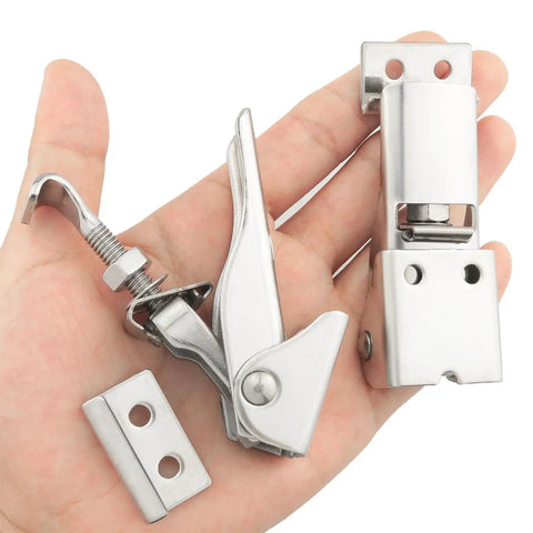 2 Pack Stainless Steel Spring Loaded Draw Latch Clamp For Cabinets And Boxes, Toggle Hasp Lock, shown in hand for size reference.