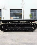 Heavy Duty Self Propelled Machinery Moving Dolly With Remote Control For Industrial Equipment Transport showcasing side view with tracks and flat surface.