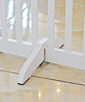 Wooden Support Feet For 360-Degree Configurable Pet Gate, White, Pair of plywood support feet on tile floor for gate stability.
