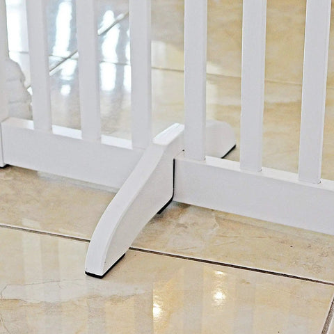 Wooden Support Feet For 360-Degree Configurable Pet Gate, White, Pair of plywood support feet on tile floor for gate stability.
