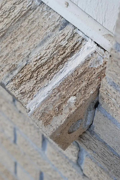 Close-up of textured masonry showing effect of sealant, ideal for use with Mor-Flexx Caulking For Mortar Gray 10.5 Oz Cartridge Pack Of 12