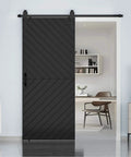 36-Inch By 84-Inch Sliding Barn Door With Modern Style, 6-Foot Hardware Kit Included, Hollow-Core Chevron Interior Door With PVC Overlay, Waterproof Surface, Scratch-Resistant, Super Easy To Install, Black Finish installed in room