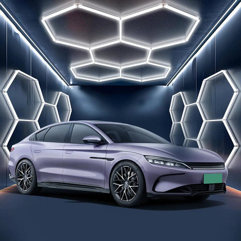Modern car parked under hexagon garage lights 60W 24V daylight white 6500K plug and play LED kit with remote dimmer