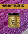 Real Deal Universal Surface Finish For Wood Leather Plastic Vinyl And Metal That Is Straight Up Waterproof And Food Safe While Acting As A Hella Solid Solvent Free Non Toxic Protection Layer Inside A Handy Four Ounce Jar For Instant Glow Ups on a colorful background with droplets.