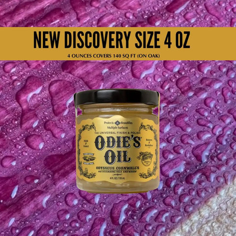 Real Deal Universal Surface Finish For Wood Leather Plastic Vinyl And Metal That Is Straight Up Waterproof And Food Safe While Acting As A Hella Solid Solvent Free Non Toxic Protection Layer Inside A Handy Four Ounce Jar For Instant Glow Ups on a colorful background with droplets.