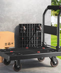 Rock Solid Heavy Duty Folding Platform Truck Rated For One Hundred Fifty Kilos with smooth rolling wheels and adjustable handle.