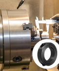Double Split Shaft Collar 1 3 8 Inch Bore, Carbon Steel Clamping Collar With Set Screw, shown in a machine tool setup.