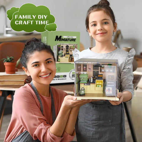 Mother and daughter holding LED Coffee Shop Mini Model Kit for DIY Dollhouse Enthusiasts in cozy home setting
