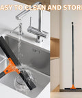 Heavy Duty 2-In-1 Floor Squeegee Workhorse With 16-Inch Rubber Blade And 6-Inch Scrub Brush 62-Inch Handle shown being rinsed