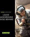 Musician using SM58 LC Dynamic Vocal Microphone For Live Gigs And Studio Sessions while playing guitar, highlighting noise reduction.