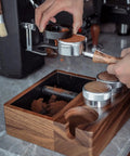 Top Shelf Wooden Espresso Knock Box Built Hella Tough With Cushioned Silicone Retrieval Bar To Smoothly Catch Spent Coffee Grounds Effortlessly Elevating Your Daily Morning Brew Routine Or Shop Station Setup featuring solid wood design and tamping tools.