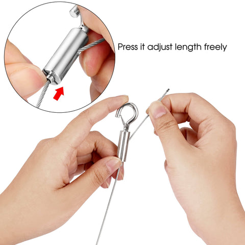 Hands adjusting the length of Adjustable Stainless Steel Hanging Wire Set 2 Piece Mirror Frame Kit 2m Long No Tools Needed 1.5mm Rope