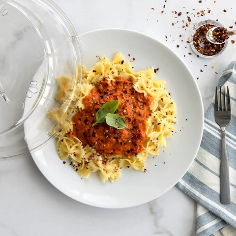 10 Inch Plate Cover Dome Shield For Mess Free Cooking And Keeping Leftovers Hot over pasta on white plate