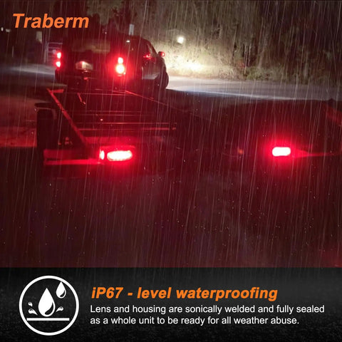Heavy Duty Steel Trailer Light Box Housing Kit With 6 Inch Oval Red LED Taillights And 2 Inch Round Red Marker Lamps at night in rain