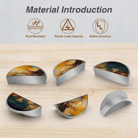 Two Pack Gold And Teal Fluid Art Cabinet Pulls With 3-Inch Hole Center Brushed Nickel Semicircle Drawer Handles displayed on surface