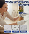 Person using All-In-One Drywall Repair Kit With Scraper And Fast-Dry Paste on wall crack, showing spackle application.