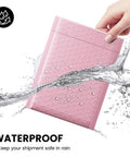 Waterproof Light Pink Bubble Mailers 6x10 Inches, 100 Pack Self Seal Padded Envelopes with Usable 6x9 Inner Size in water splash.