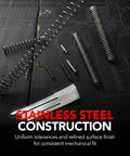 Stainless Steel Spring and Pin Replacement Kit For 1911 Style Platforms, springs and pins on dark surface, close-up view