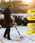 Man using Heavy Duty Flat Shovel Ice Scraper for Winter Cleanup on snowy driveway