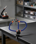 Three Arm Soldering Helping Hands Station With Adjustable Clips And Heat Resistant Stainless Steel Clips on workbench