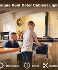 Father and son in kitchen with Under Cabinet Lighting Kit With Six Dimmable LED Lights, Touch And Remote Control, warm white light.