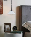 Plug In Pendant Light With Alabaster Glass Shade In Black Dimmable Swag Lamp With Long 16.4 Ft Cord And 14.7 Ft Chain over a bedside table
