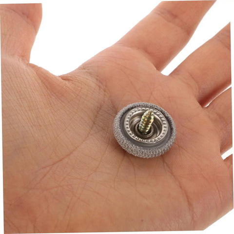Headliner Repair Rivets Kit for Cars, Quick Interior Roof Fix shown in hand for scale, dark grey durable fastener.