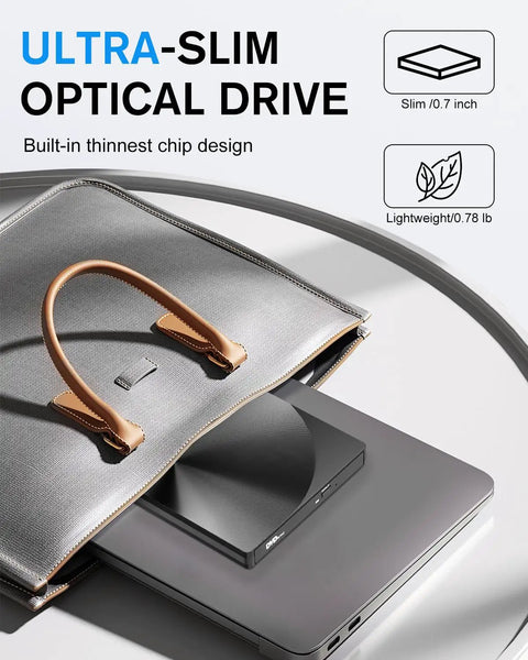External CD DVD Drive With USB 3.0 And Type-C Plug And Play Portable Burner For Laptops And Macs No Extra Power Needed Ultra Slim Travel Ready Optical Drive, ultra-slim 0.7-inch black drive on a laptop
