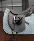 Dressage Saddle Pad With Moisture Wicking Tricot Backing In Misty Jade, foam polyfill diamond quilt on horse.
