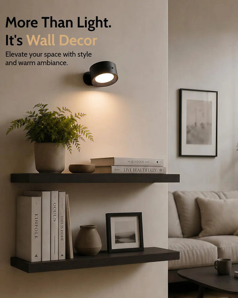 Cordless Rechargeable Wall Sconces With Remote, Magnetic Led Bedside Lamp In Sleek Black mounted on shelf with decor.
