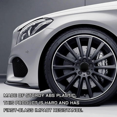Premium 4 Pack Wheel Center Caps For Cars Trucks And Suv Snap In Rim Hub Covers Waterproof Rust Resistant Decoration Upgrades Your Ride With Sleek Black Finish Badass Protection For Every Vehicle And Tight Fit Guarantee on a stylish silver vehicle wheel.