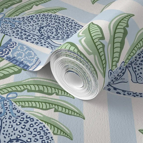 Top Shelf PVC Free Preppy Wallpaper With Heavy Duty Matte Linen Texture Ideal For Busy Homes Or Tight Offices close-up of rolled wallpaper with blue and green leaf design