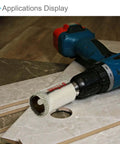 Side view of CoCud diamond core drill bit, 7mm diameter, mounted on a blue cordless drill.