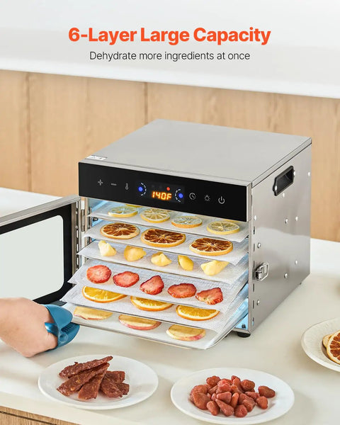 Six Tray Stainless Steel Food Dehydrator With 400W Power, Adjustable Temperature, And 24 Hour Timer in use with fruit and jerky.