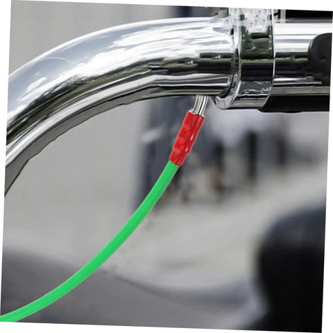 Flexible Brake Line Hose for Motorcycles, Scooters and Dirt Bikes connected to a chrome handlebar with green braided sleeve