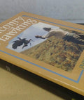 Cover of Falconry and Hawking book, depicting a falconer and bird, related to Ultimate Falconry and Hawking Handbook.
