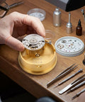 Watch Movement Holder With Durable Aluminum Alloy Base Repair Stand For 2892 And 2824 Movements in use on workbench.