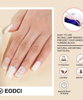 Close-up of manicured nails using Milk White Nail Dip Powder, featuring an elegant hand design, no lamp required.