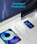 Super Slick Flat Plug Power Strip With 5 Ft Extension Cord 6 Widely Spaced Wall Outlets Plus 3 Fast Charge USB Ports For Hiding Behind Furniture Setup White 2 Pack Bundle on desk with devices.