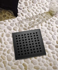 Shower Drain 24 Inch With Removable Pattern Grate Matte Black Stainless Steel 304 Anti Corrosion Built To Last Floor Drain With 2 Inch Center Outlet For Linear Drain And Easy Cleaning on pebble tile floor
