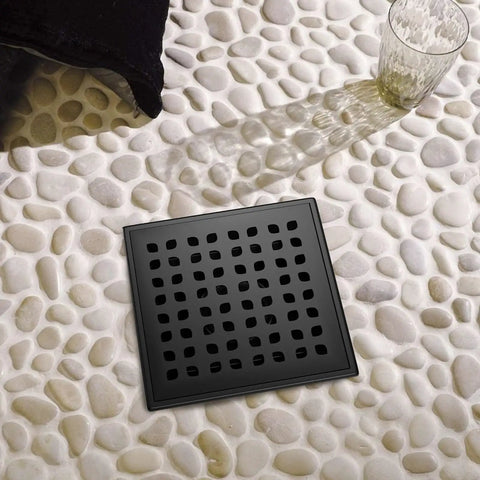 Shower Drain 24 Inch With Removable Pattern Grate Matte Black Stainless Steel 304 Anti Corrosion Built To Last Floor Drain With 2 Inch Center Outlet For Linear Drain And Easy Cleaning on pebble tile floor