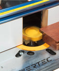 Heavy Hitter Two Inch Slab Flattening Router Bit With Quarter Inch Shank and Sharp Carbide Tips cutting through wood for smooth finishes.