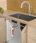 UF-15 Carbon Block Water Filter Replacement For Coral UC100 Under Sink Filtration System installed in kitchen cabinet