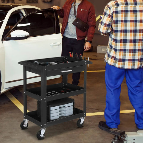 Beefy Three Tier Rolling Tool Cart With Drawer On Wheels, 330 LBS Capacity Heavy Duty Utility Cart With Two Brakes, Industrial Steel Tool Organizer For Garage, Mechanic Shop, Warehouse And Repair Bay in garage beside car