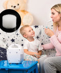 Mother using nebulizer with child, black circle inset showing round white sponge from 96 Pcs Nebulizer Filter Replacement Kit for Compressor Systems.